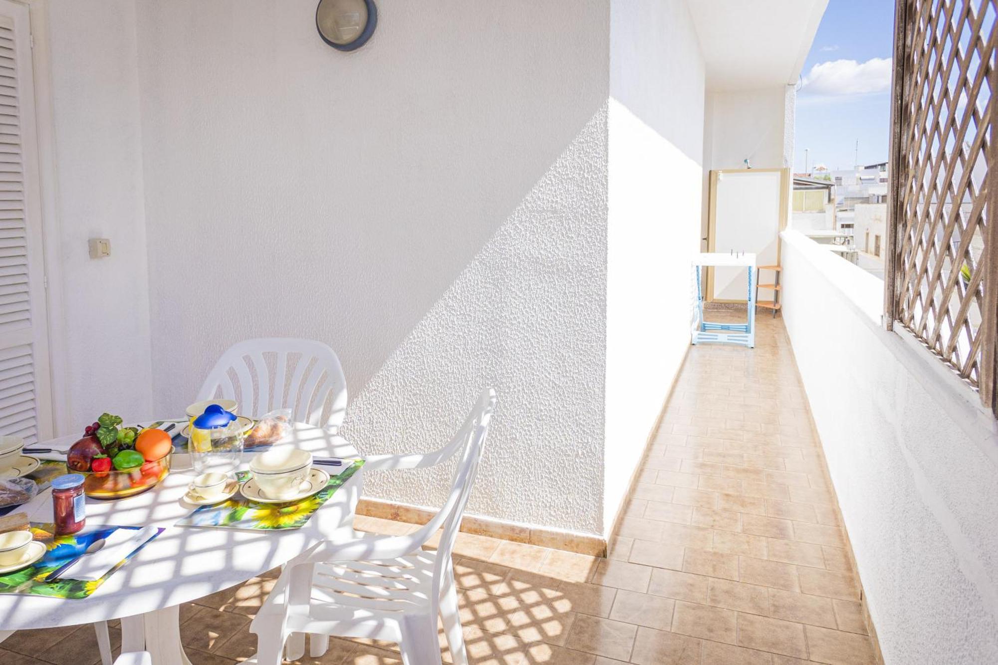Torre Lapillo Apartment Sea View - Happy Rentals Порто-Чезарео Екстер'єр фото