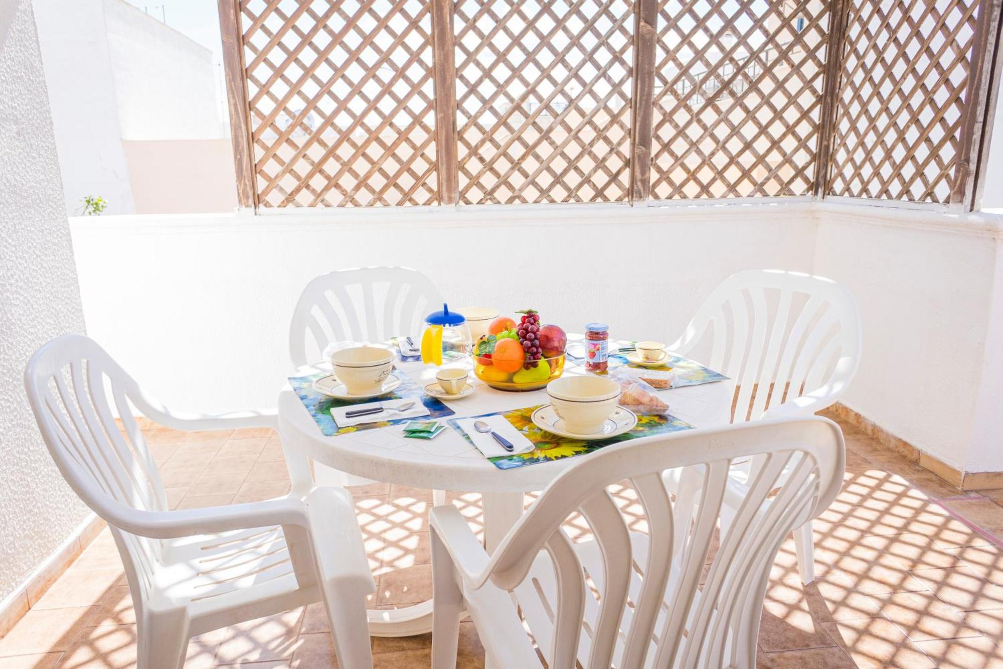Torre Lapillo Apartment Sea View - Happy Rentals Порто-Чезарео Екстер'єр фото